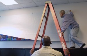 RStomokounveil copy NIAD teacher Tomoko Murakami had to climb a ladder before unveiling the mural.