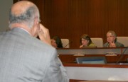City Finance Director Jim Goins, left, fields questions from members of the city council Tuesday about a 5 percent rate increase for users in the Richmond Municipal Wastewater District. The council approved the increase 6-1. Photo by Ian A. Stewart.