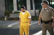 A sheriff's deputy escorts Manuel Ortega, 19, to the side entrance of the Contra Costa County Courthouse in Martinez. Ortega is one of seven suspects charged in the rape and beating of a Richmond High student.