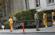 County sheriff's deputies escort defendants Manuel Ortega, Marcelles Peter, Elvis Torrentes, John Crane Jr., and Jose Montano to the courthouse.