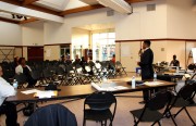 The Rev. Julius Van Hook spoke to a small crowd during an peace forum Thursday. Advocates are trying to get the community involved in youth violence prevention efforts.