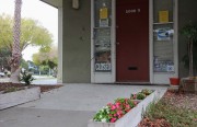 An office door at Crescent Park Apartments is punctured by 42 bullet holes after a security guard allegedly went on a shooting rampage and shot his supervisor.