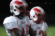 Kenneth Walker III remains focused analyzing the game next to Fullback Francisco Ortiz. Walker III has decided to attend Cal Berkeley in the fall. (Photo by Alexis Kenyon)