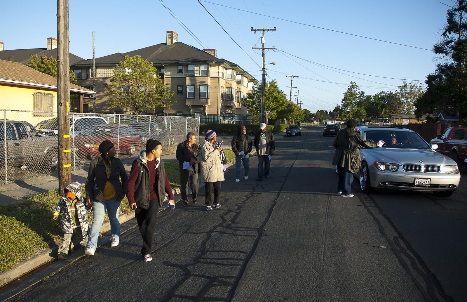 Richmond residents take to the street, pass out fliers, to stop gun
