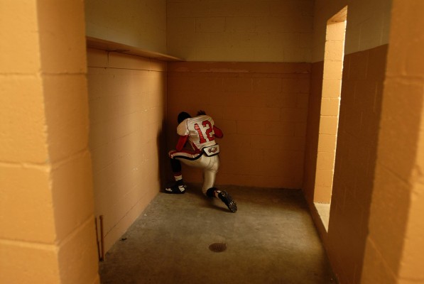 Francisco Ortez III takes time to pray prior to the game against Joseph Bethel. Bethel went on to defeat Kennedy Friday night in Vallejo, 27-16. (Photo by Tyler Orsburn)