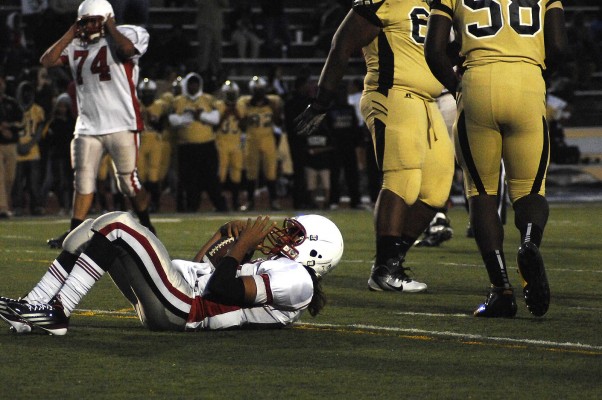 Roman Espinoza is sacked by Joseph Bethel's defense. Bethel went on to defeat Kennedy Friday night in Vallejo, 27-16. (Photo by Tyler Orsburn)