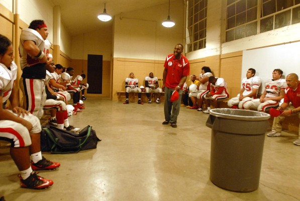 Kennedy head coach gives his team a pep talk after the Joseph Bethel game. Bethel went on to defeat Kennedy Friday night in Vallejo, 27-16. (Photo by Tyler Orsburn)