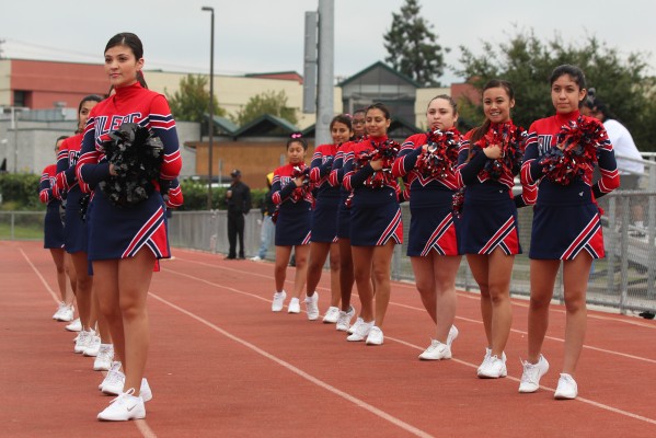 Richmond High cheerleaders kept their spirit up for over three hours during the Oilers' first winning game in nearly two years. (Photo by: Avni Nijhawan)