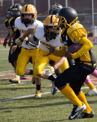The Steelers run for a first down. (Photo by: Lauren Kate Rosenblum)