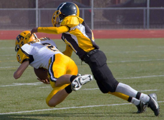 The Steelers tackle the Palo Alto Knights but they maintain possession. (Photo by: Lauren Kate Rosenblum)