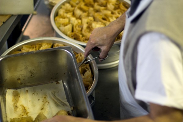 Helodoro Ponce got his "flavor hands" from his father, but his mother taught him how to make the restaurant's sought-after tamales. (Photo by: Rachel de Leon)