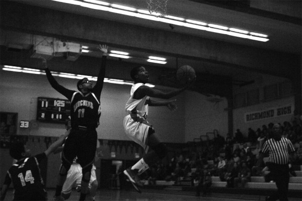 Mukama Madoshi attempts a reverse layup in the first half against Hercules. The Oilers second leading scorer only had two points on the night. (Photo by: Tyler Orsburn)