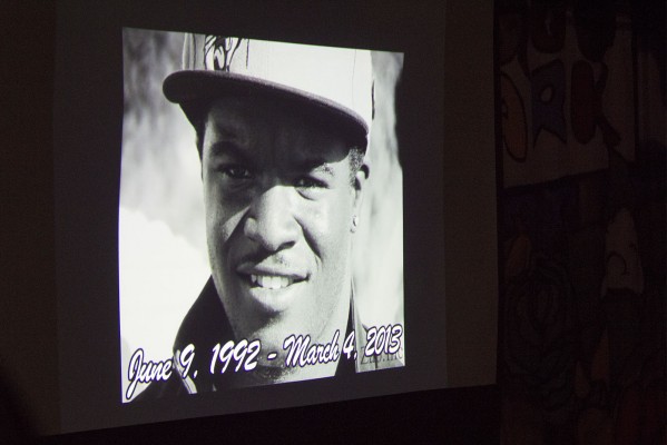 Pogo Park staff put together an audio slide show for the vigil. The show ended with a black and white photograph of Lincoln Plair. (Photo by: Jennifer Baires)