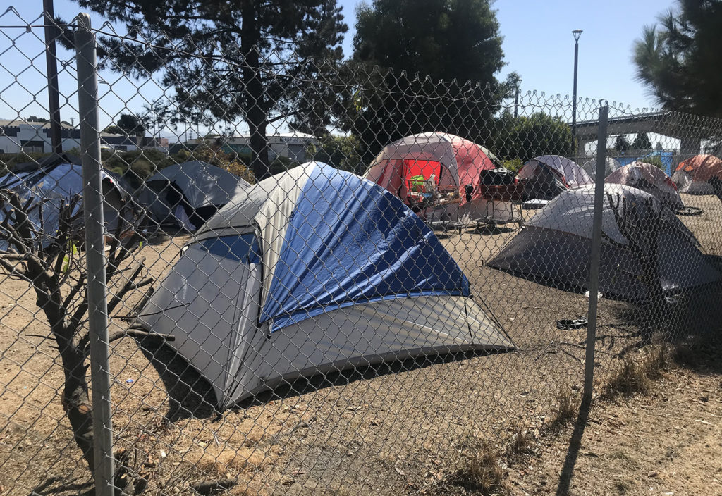 Mayor promises long-term homeless plan, but surprise evictions of